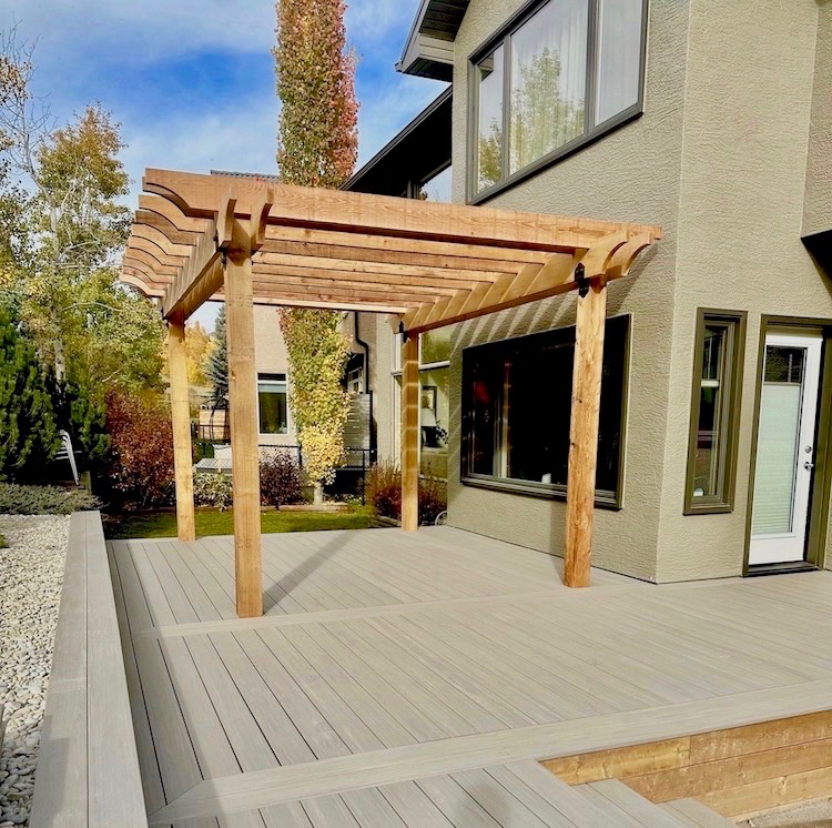 Composite deck with a cedar pergola