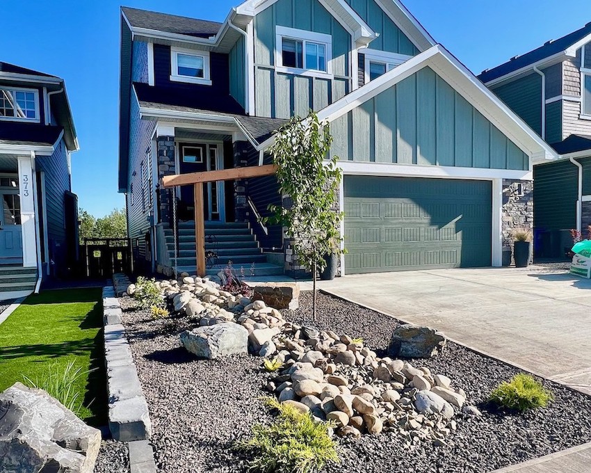 Low-maintenance landscape design with paths and plantings