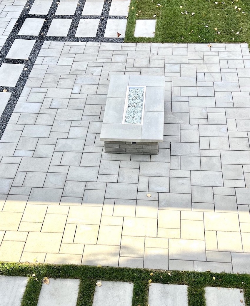 Paving-stone patio with a built-in fire pit